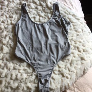 Grey body suit